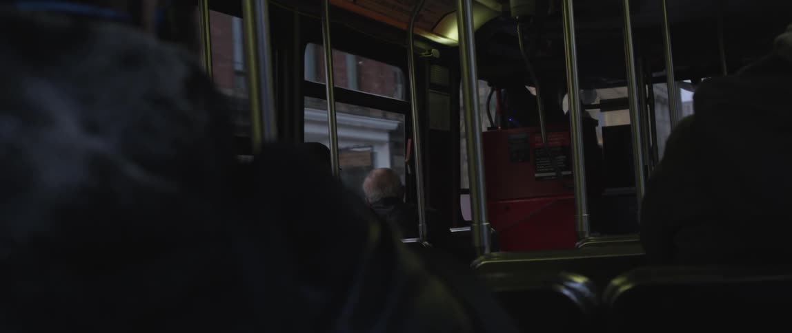 People are riding a bus