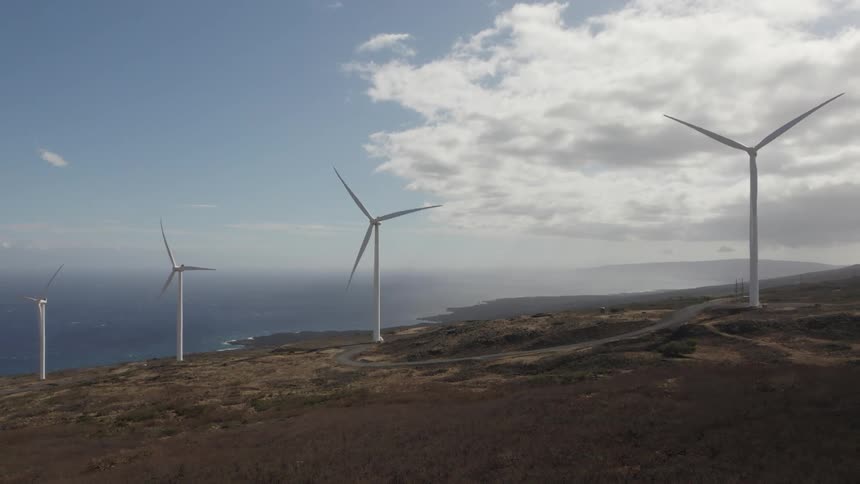 A view of windmills rotating outdoors