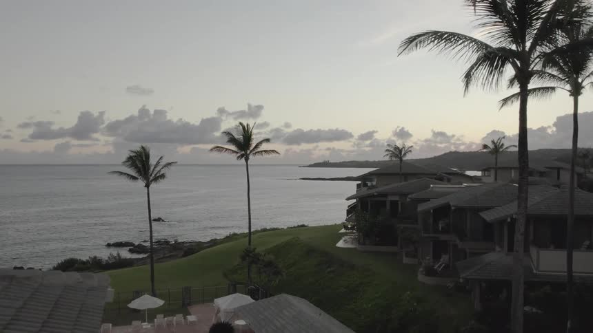 An aerial view of buildings next to the beach