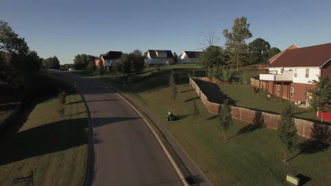 Someone is mowing the yard