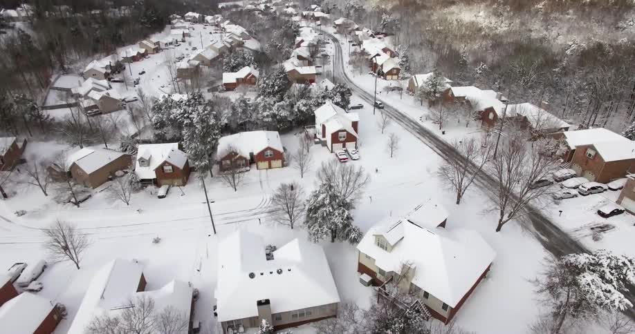 Aerial view of a snow-covered residential area