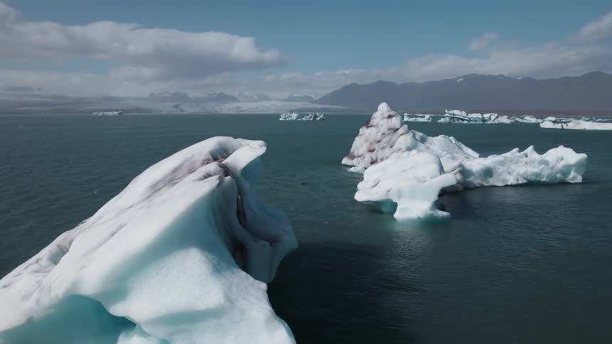 An aerial view of icebergs outdoors