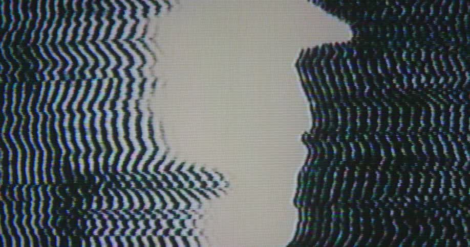 Dark blue and white lines make patterns on a screen