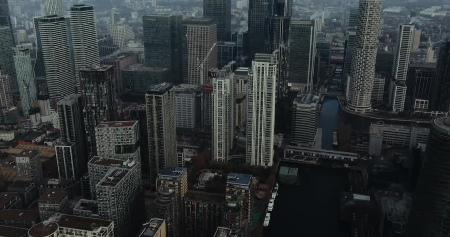 An aerial view of skyscrapers in a large city in the daytime