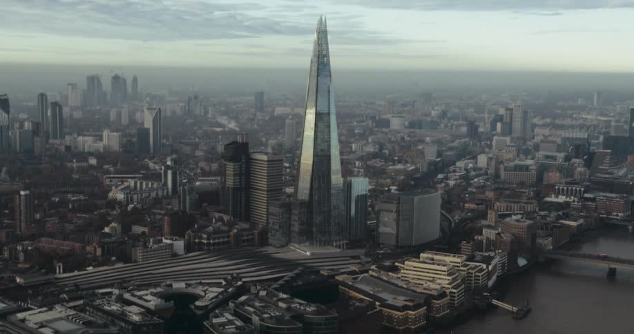 An aerial view of a large city wtih tall buildings