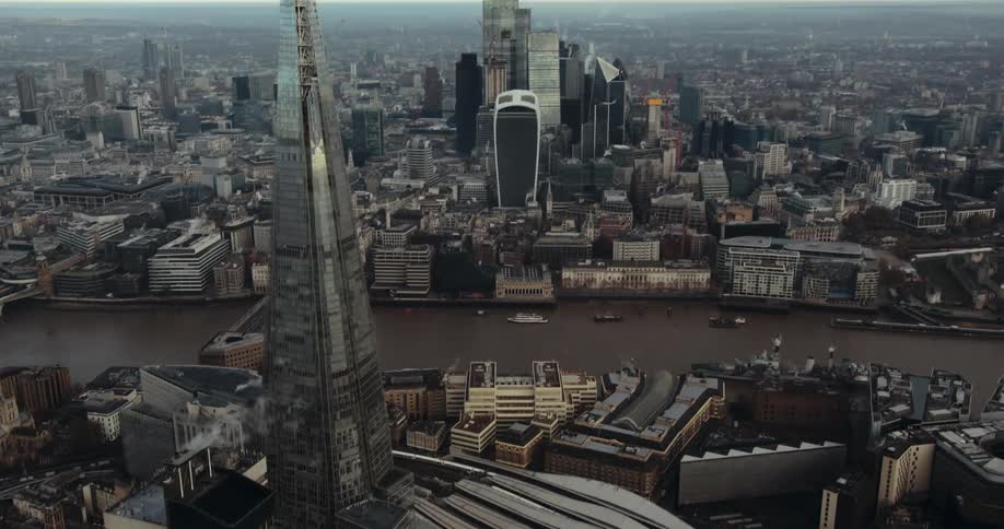 An aerial view of a city with tall buildings