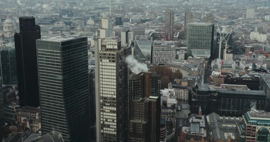 Aerial view of high rise office buildings and tall buildings in the city