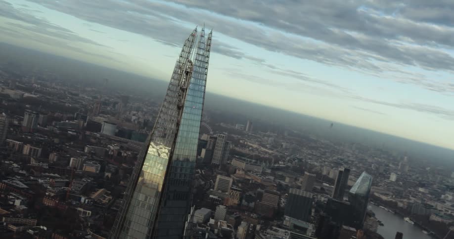 Light shimmers and reflects off the shard building in london