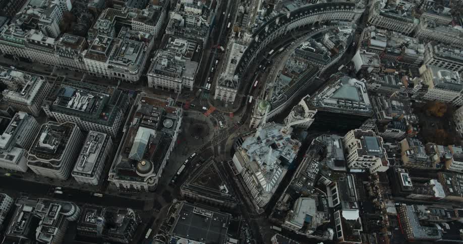 An aerial view of buildings and streets in a city