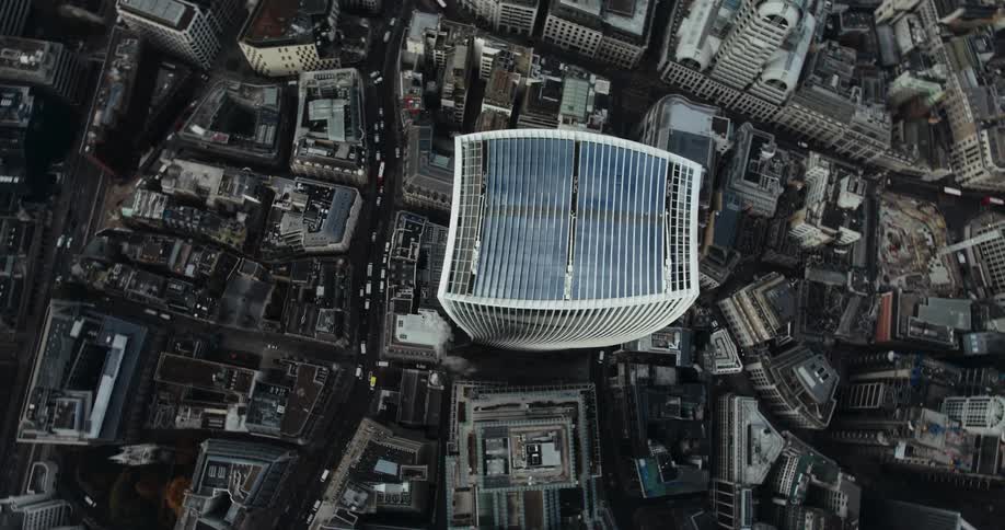 An aerial view of tall skyscraper in a city