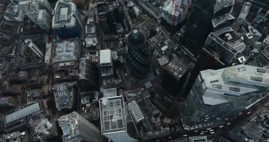 Tall buildings in a metropolis from above during the day