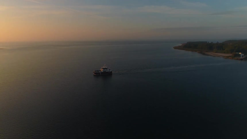 A ferry makes it way across the ocean