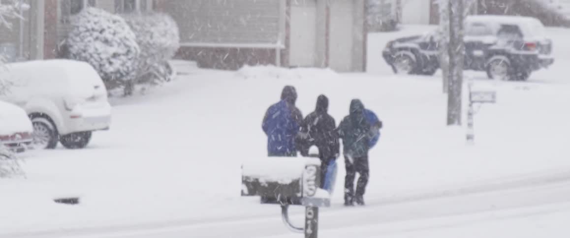 People walking outside in the snow