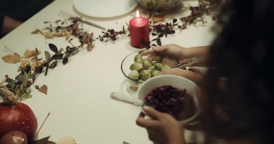 Food is being served on the dinner table