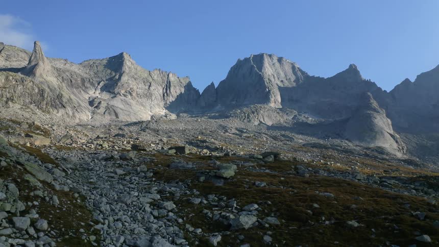 Mountain ridge with peaks high in the sky