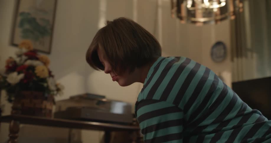 A girl is playing in her living room
