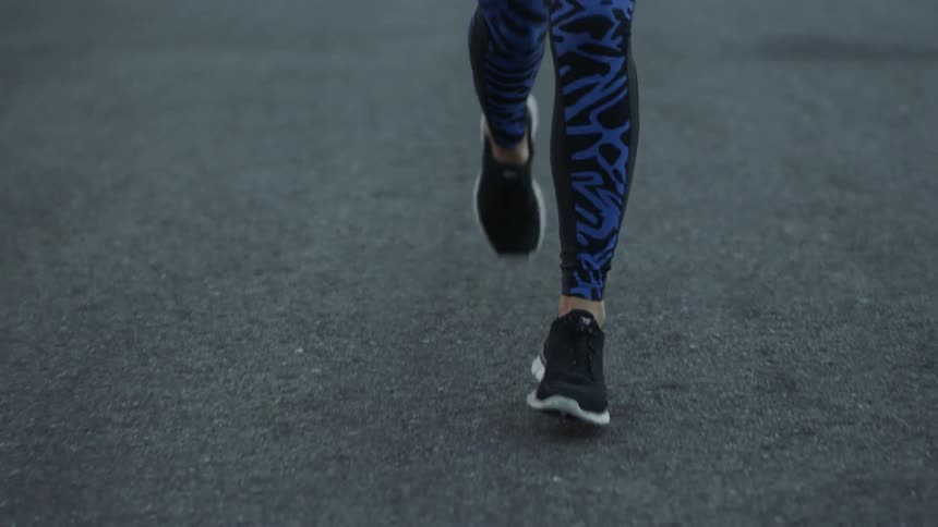 Close up of legs running in a street
