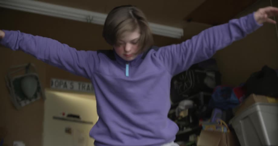 A girl practices on rollerblades