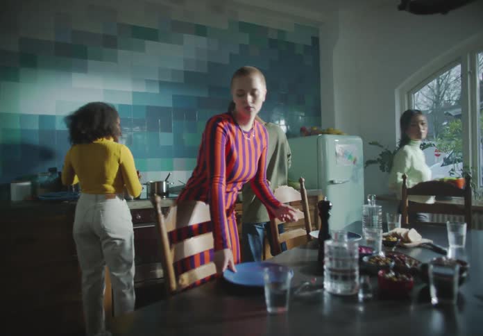 A view of a group of friends in a room