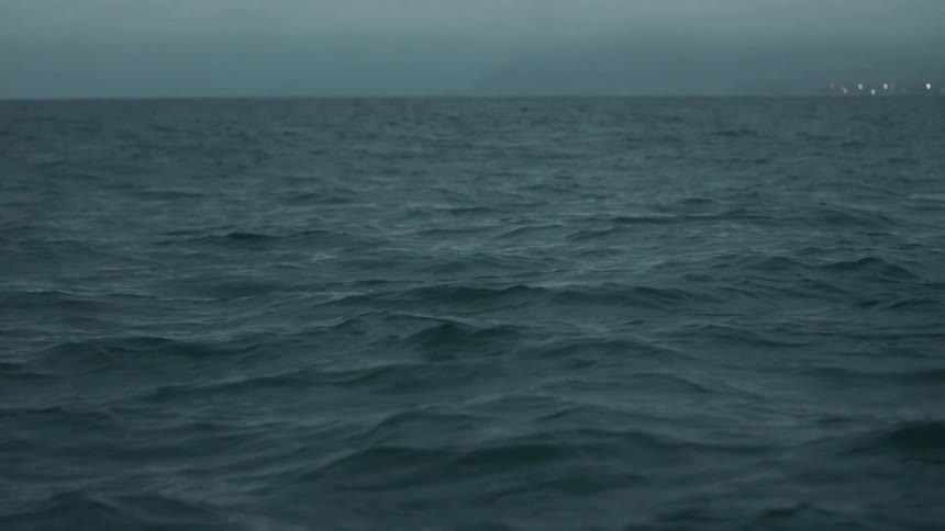 Waves roll on a cloudy day