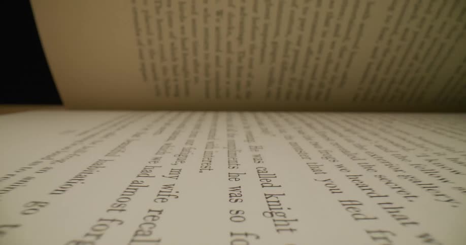 Close up view of pages on a book is displayed