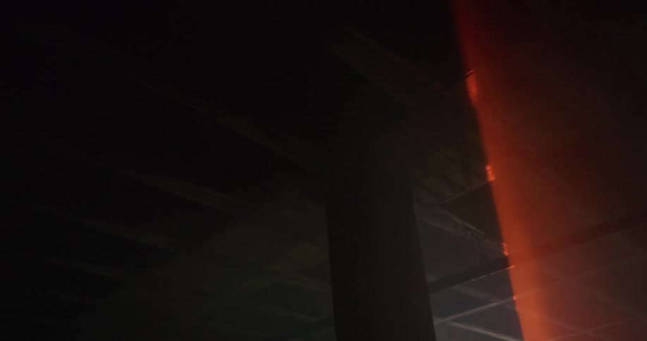 A red light is shining in a building