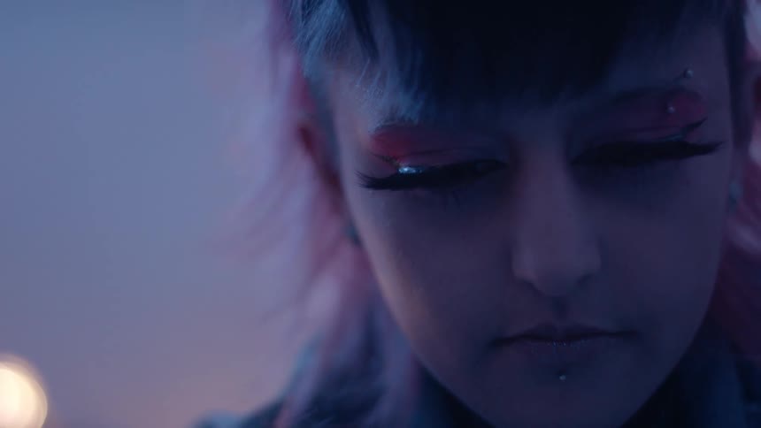Closeup view of a womans face with makeup