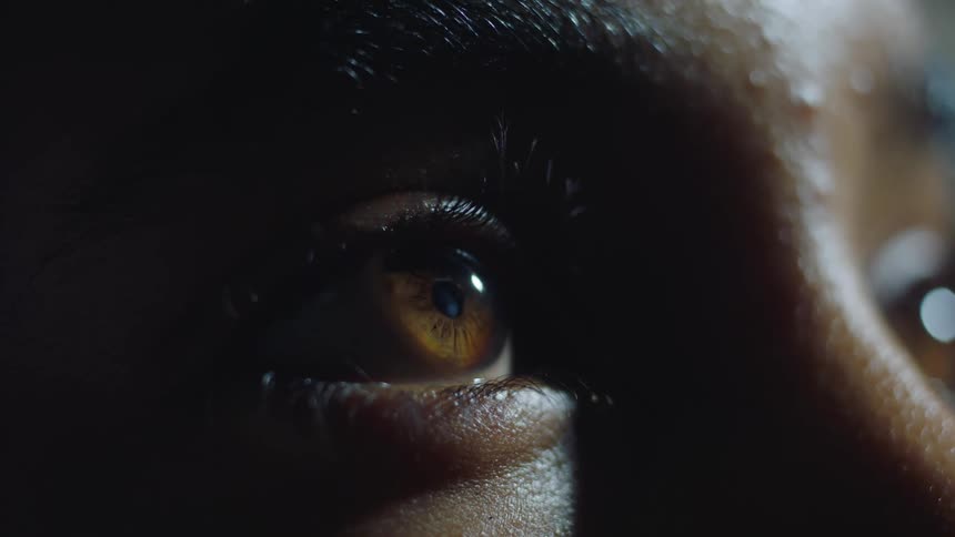 A closeup view of a persons face is displayed