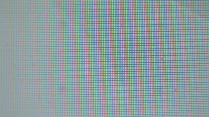 Lights and lines flash on a pixelated screen