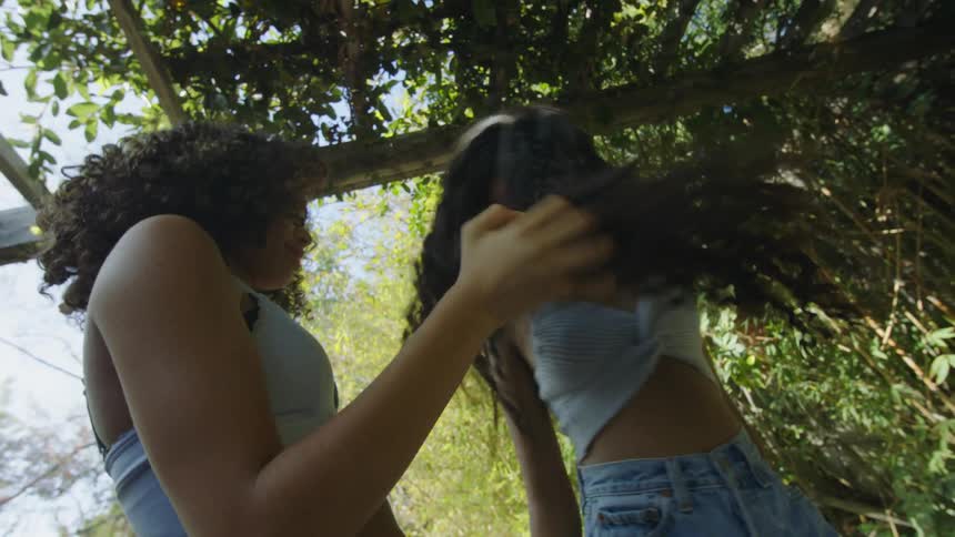 Two women are outdoors and having fun in spring