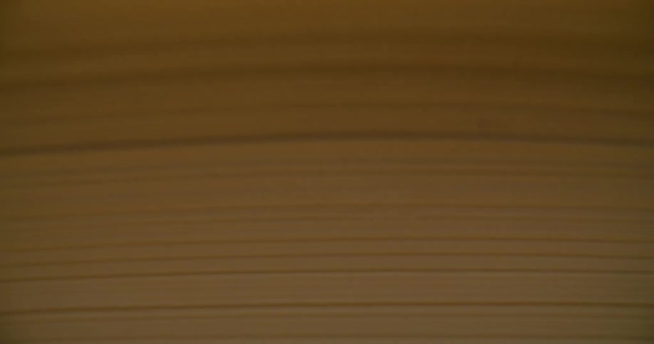 Close up of a large book closing
