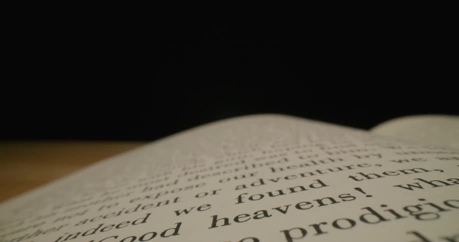 Close up of a book spread open on a desk