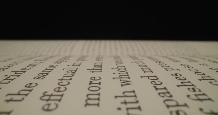 Close up view of the text on pages of a book