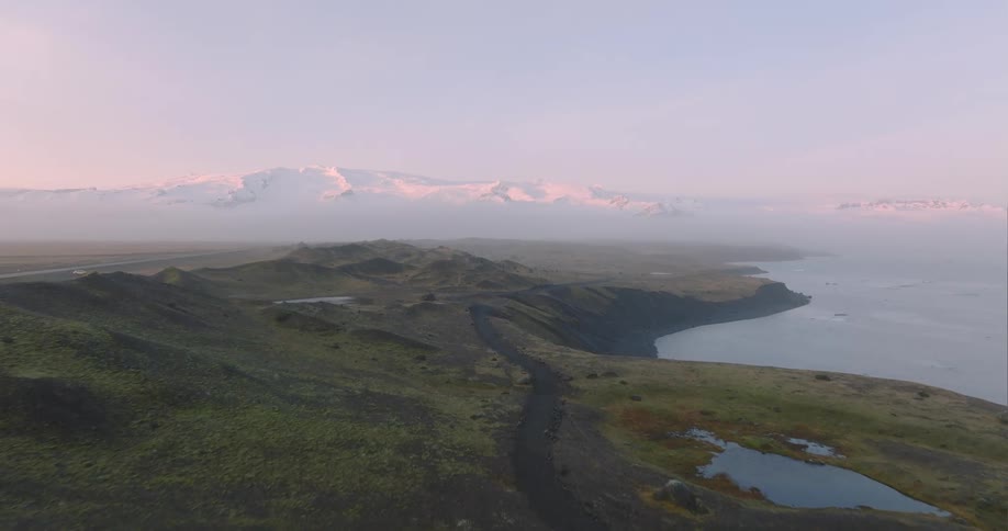 Aerial view of the sun setting in the horizon is displayed