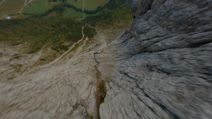 An aerial view of rocky mountain terrain in the wilderness