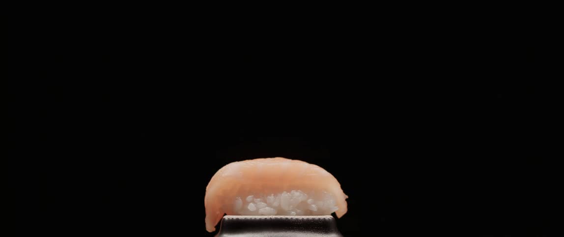 Seafood is shown on display ontop of a scale
