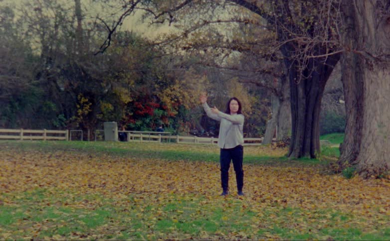 A woman is dancing on the field