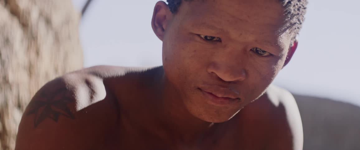 Young tribal man getting ready for hunt