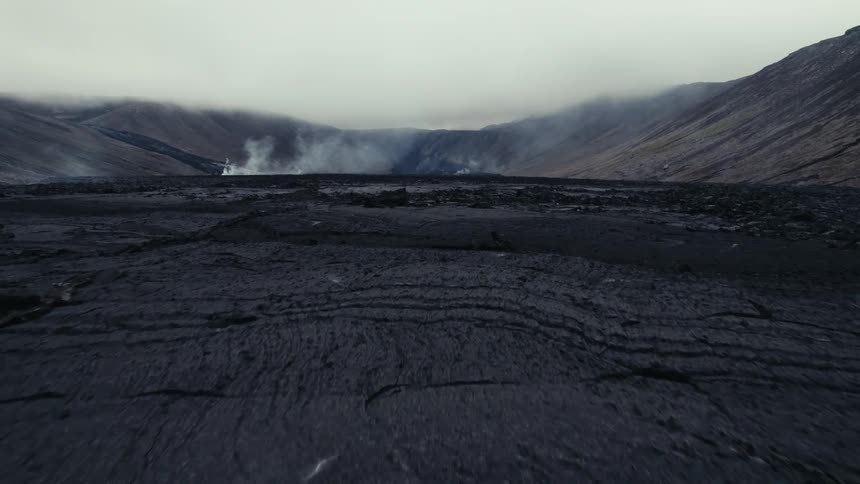 Aerial view of mountainous landscape is displayed