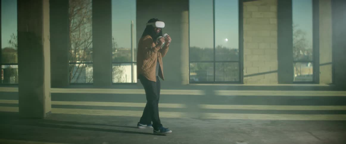 A man is playing virtual reality indoors