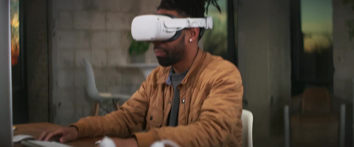 A man putting on a vr headset