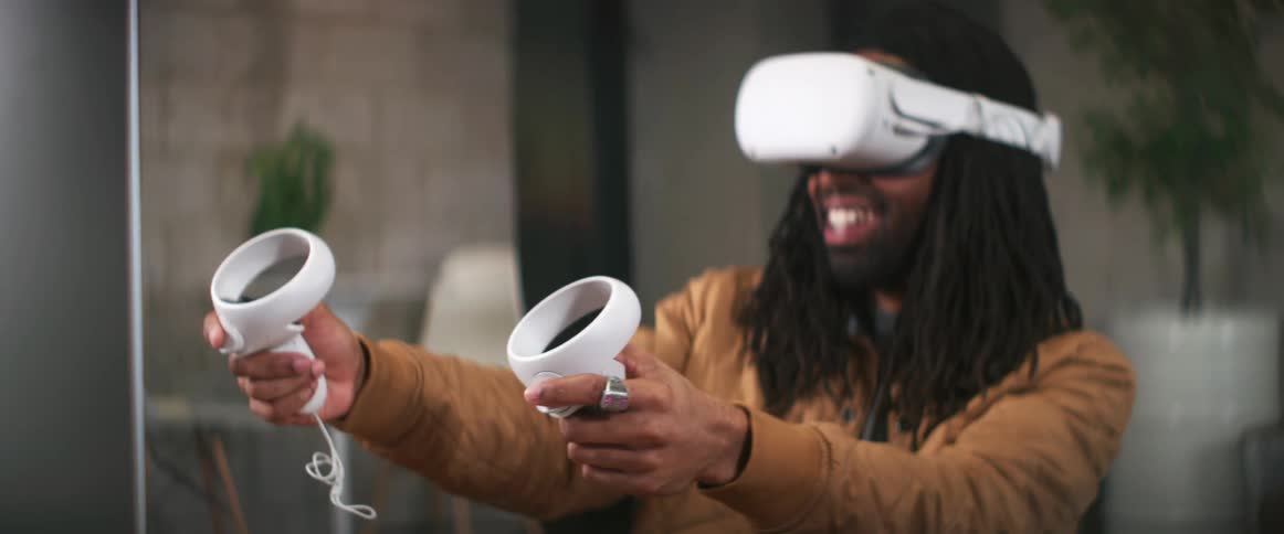 A man playing a game in virtual reality