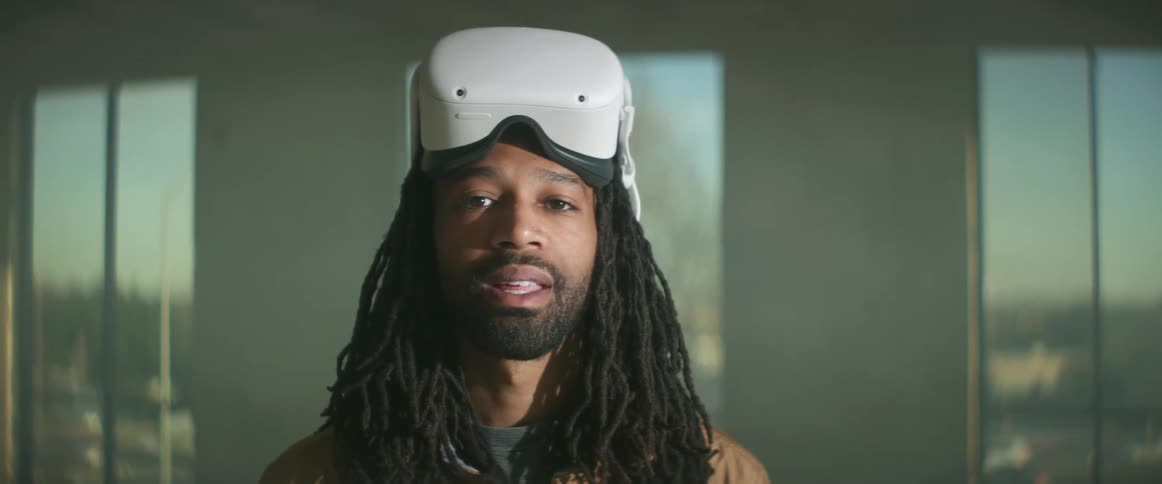 A portrait of a man with a vr headset on his head