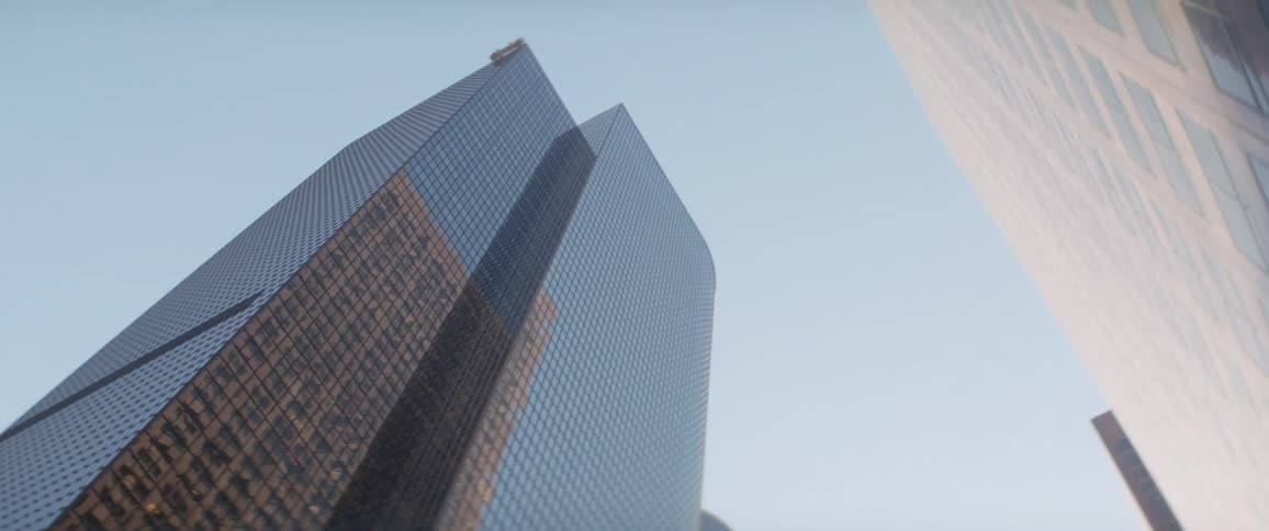 Tall skyscrapers towering overhead on a clear day