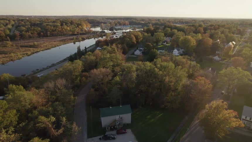 Aerial view of houses in a neighborhood at dusk