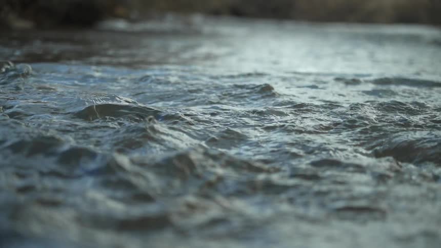 River water flowing and rippling in nature