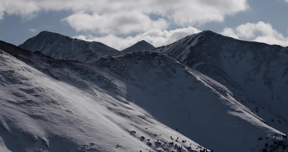 The mountain range is covered with snow