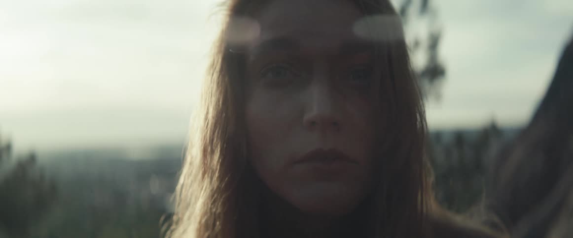 A portrait of a woman outdoors