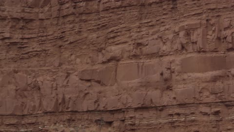 A rock wall in the daytime