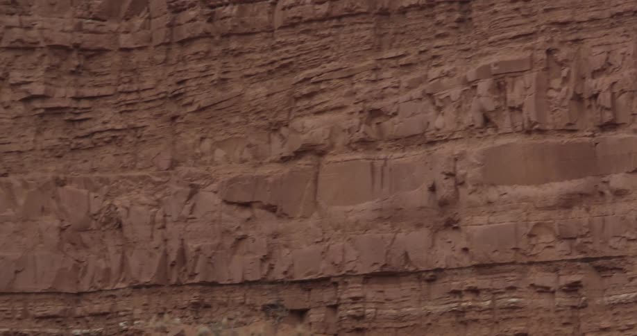 A rock wall in the daytime